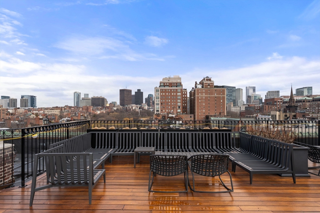 50 Commonwealth Avenue, Unit 204 Boston, MA 02116 - Photo 20 of 21 a view of a balcony with wooden floor