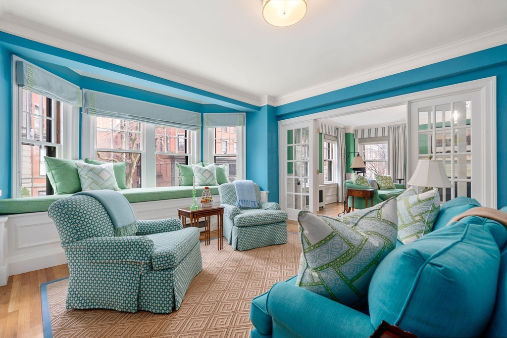 50 Commonwealth Avenue, Unit 204 Boston, MA 02116 - Photo 5 of 21 a living room with furniture and a large window