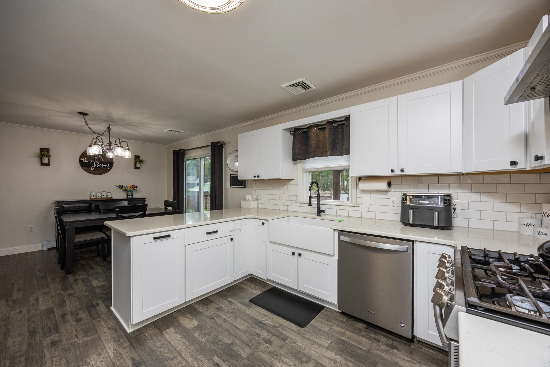 405 Old Goshen Road Ocean View, NJ 08230 - Photo 13 of 38 a kitchen with a sink stove and microwave