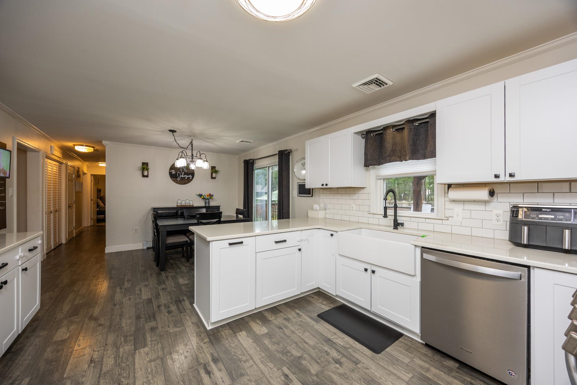 405 Old Goshen Road Ocean View, NJ 08230 - Photo 15 of 38 a kitchen with granite countertop a sink appliances cabinets and furniture