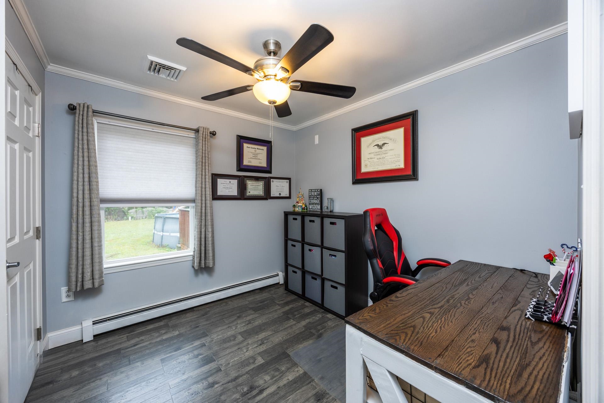 405 Old Goshen Road Ocean View, NJ 08230 - Photo 17 of 38 a view of a workspace with furniture and a window