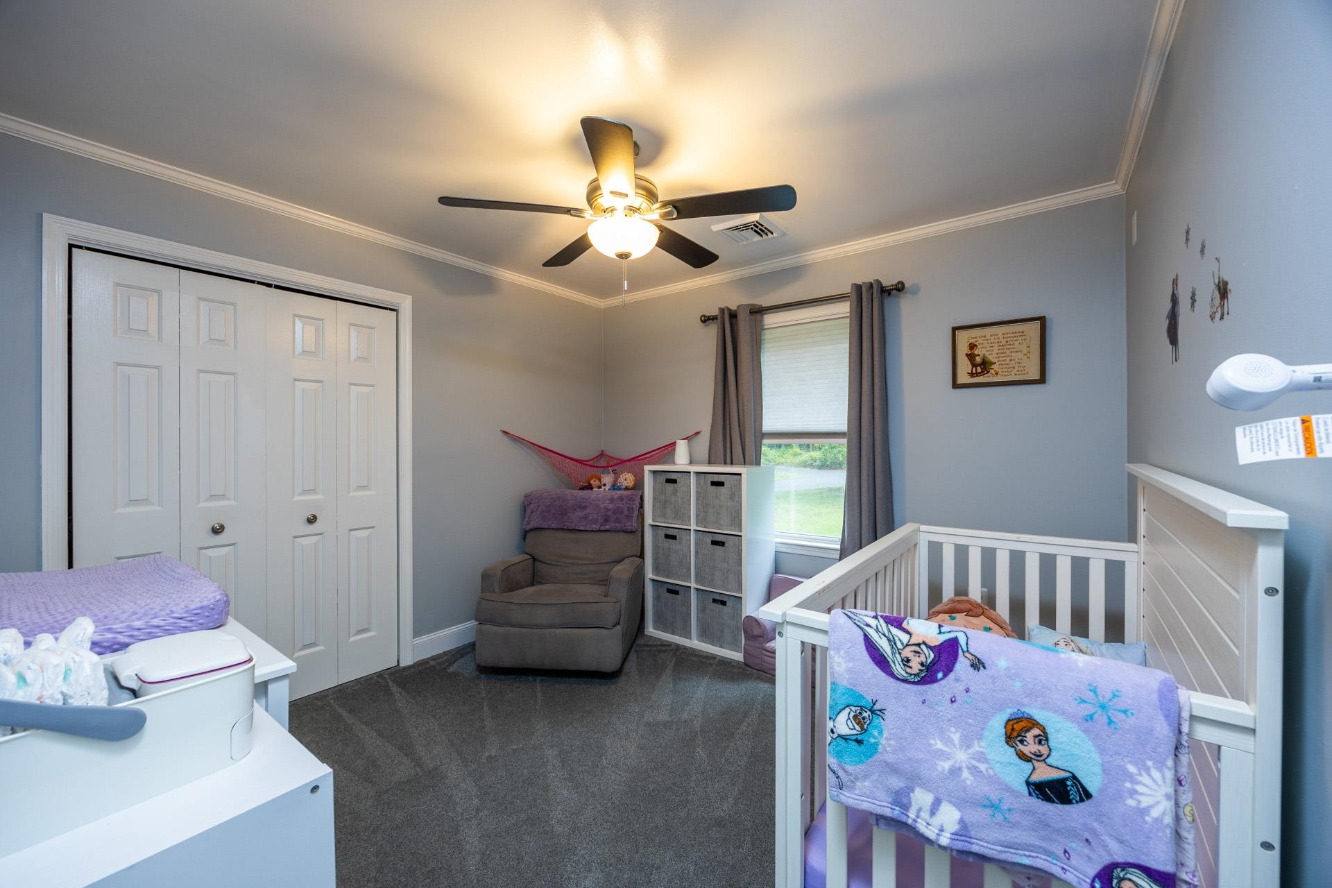 405 Old Goshen Road Ocean View, NJ 08230 - Photo 20 of 38 a bedroom with a bed and wooden floor