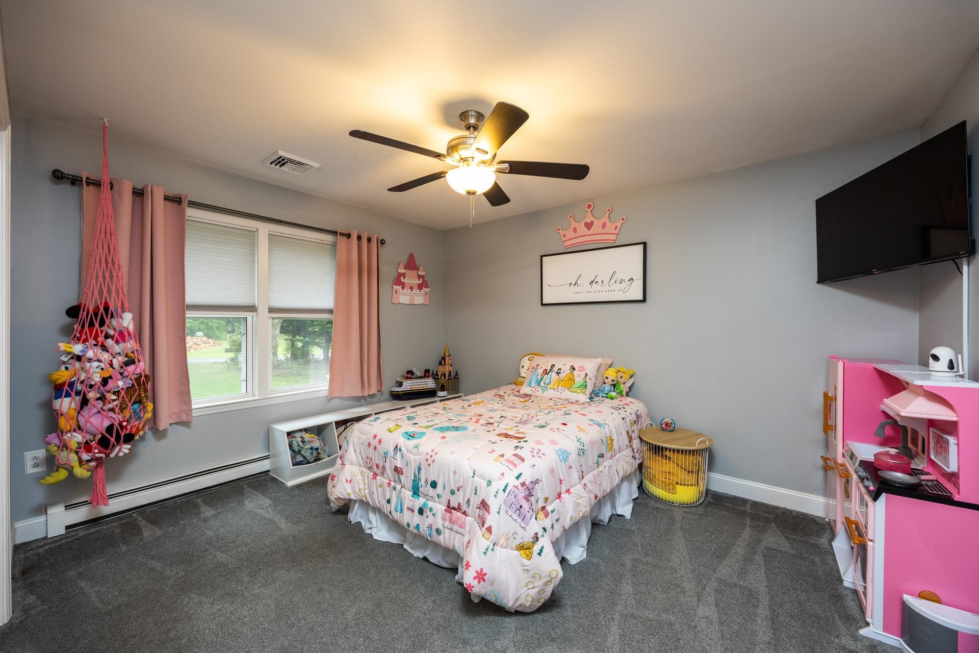 405 Old Goshen Road Ocean View, NJ 08230 - Photo 23 of 38 a bedroom with a bed and a window