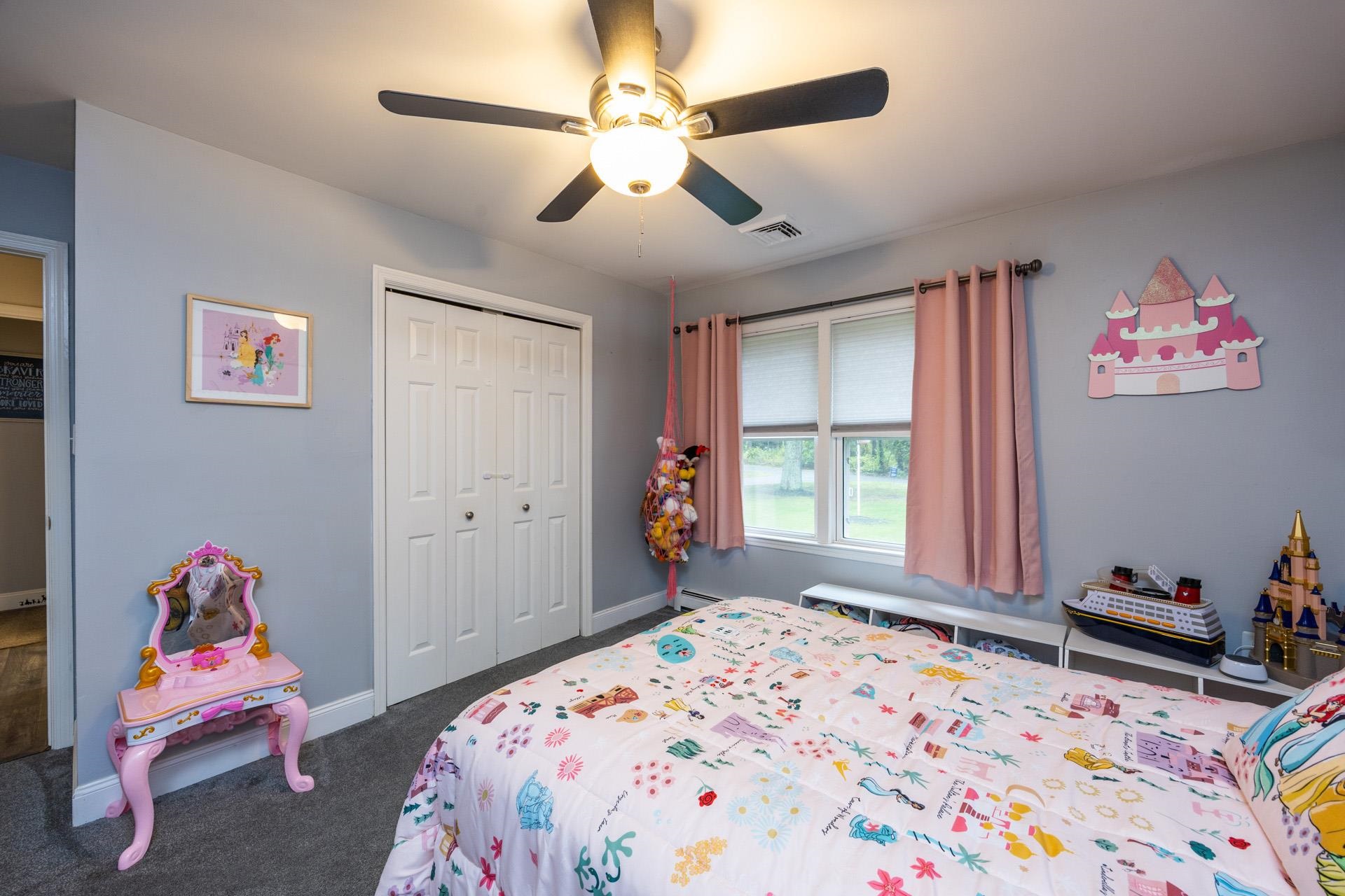405 Old Goshen Road Ocean View, NJ 08230 - Photo 25 of 38 a bedroom with a bed and a window