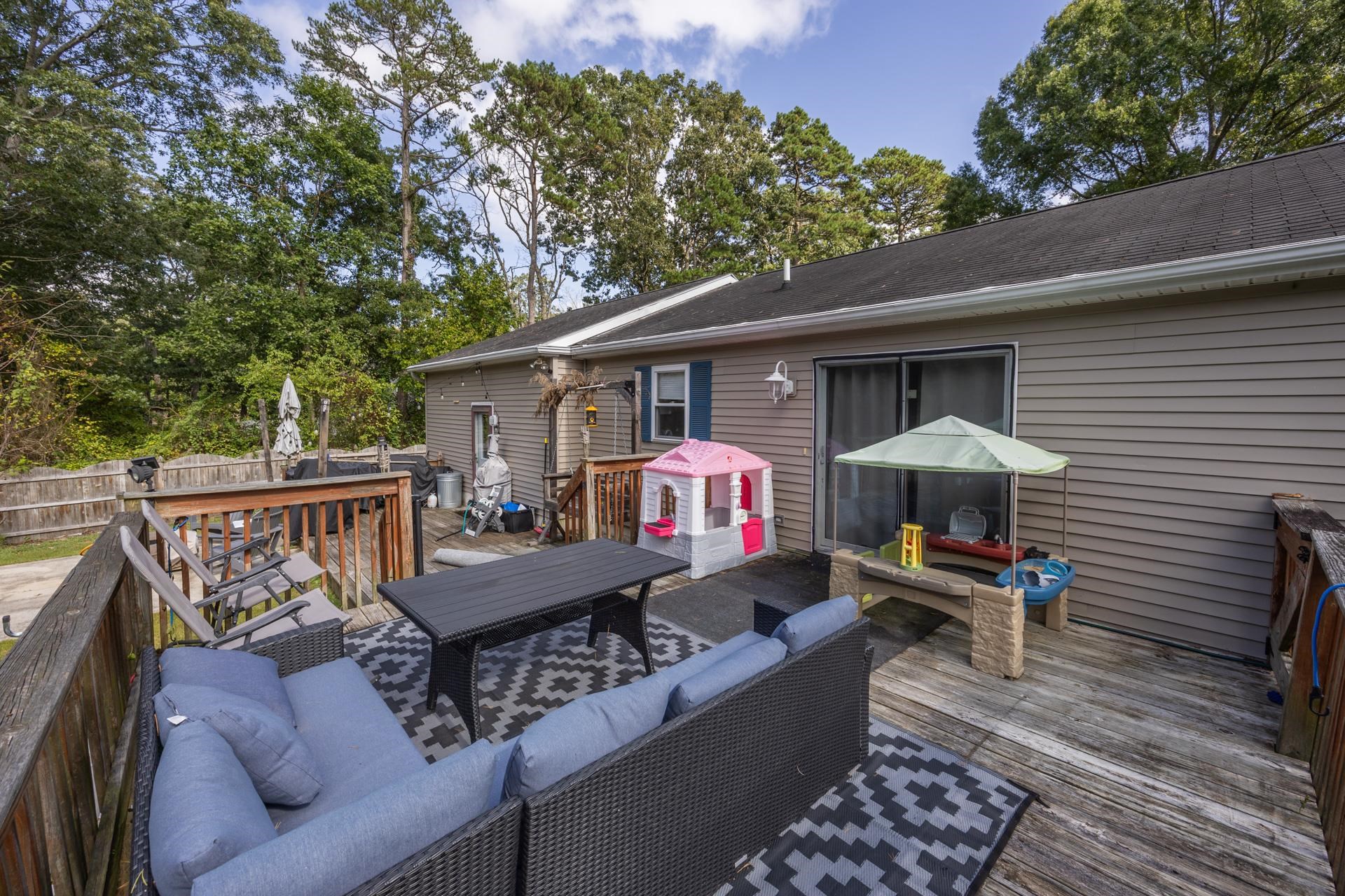 405 Old Goshen Road Ocean View, NJ 08230 - Photo 32 of 38 a view of a roof deck with furniture