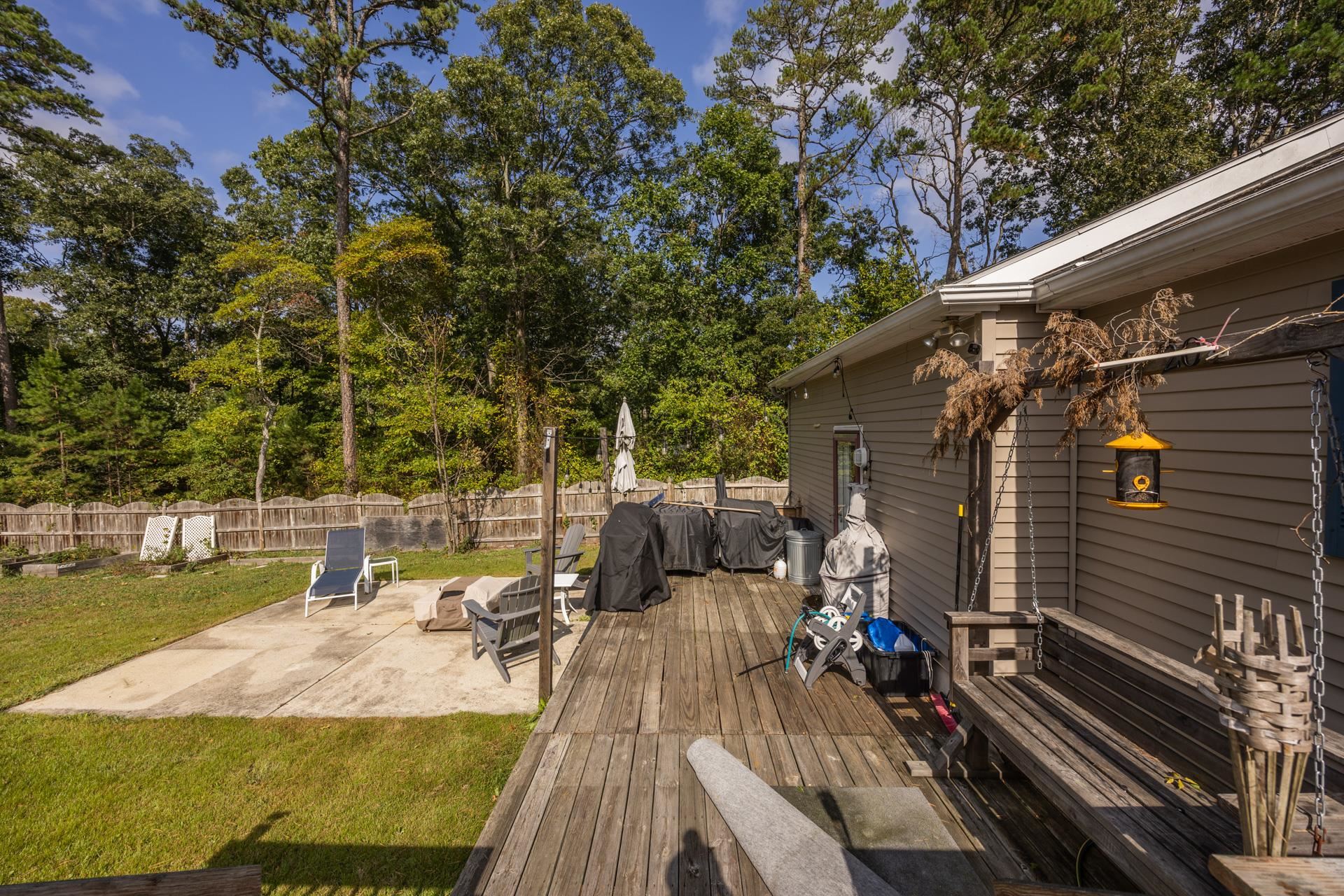 405 Old Goshen Road Ocean View, NJ 08230 - Photo 33 of 38 a view of a patio with chairs and potted plants