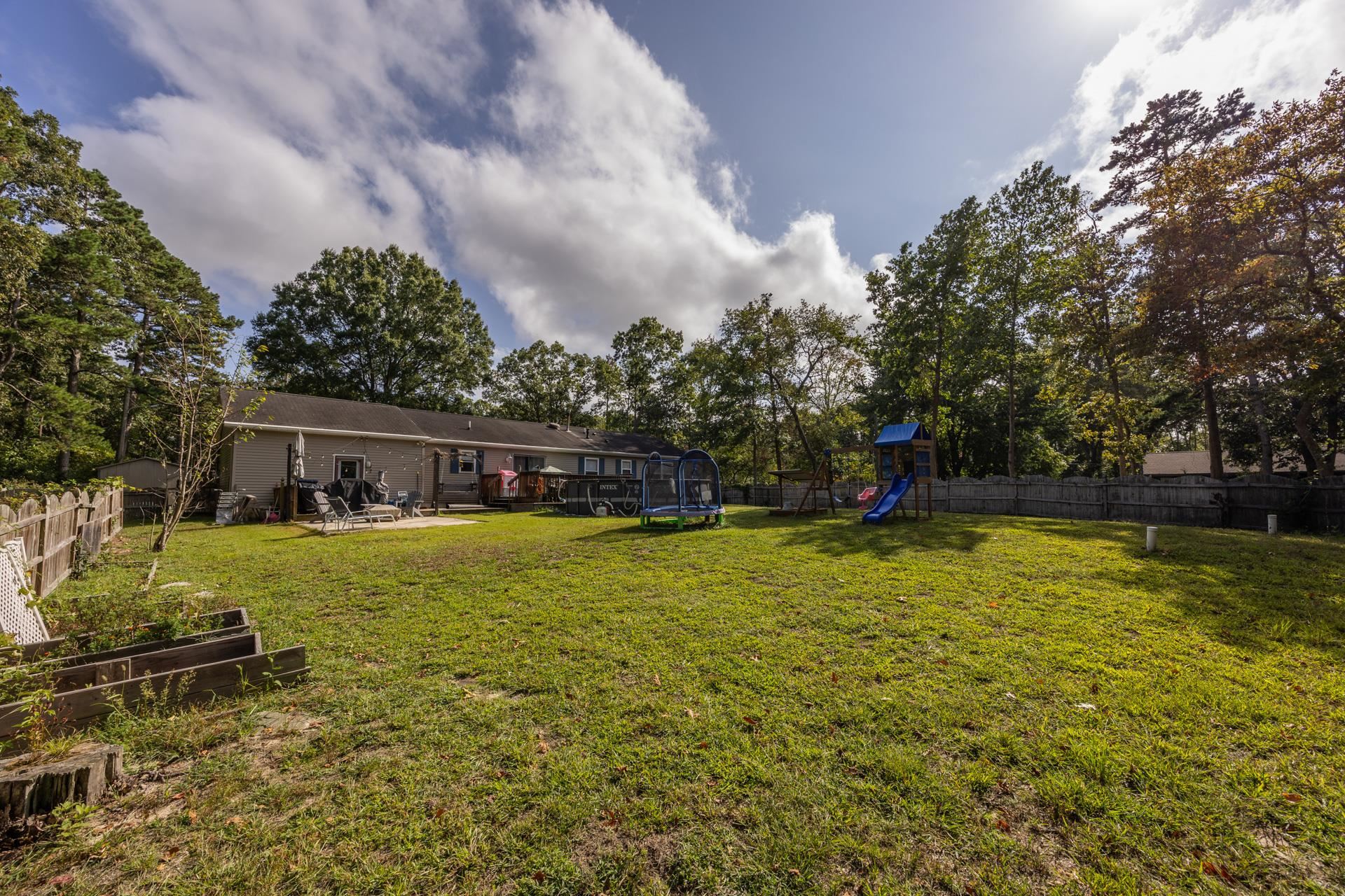 405 Old Goshen Road Ocean View, NJ 08230 - Photo 37 of 38 a view of a house with a yard