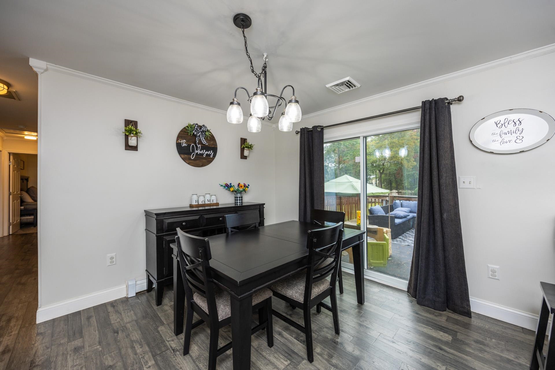 405 Old Goshen Road Ocean View, NJ 08230 - Photo 9 of 38 a view of a dining room with furniture window and wooden floor