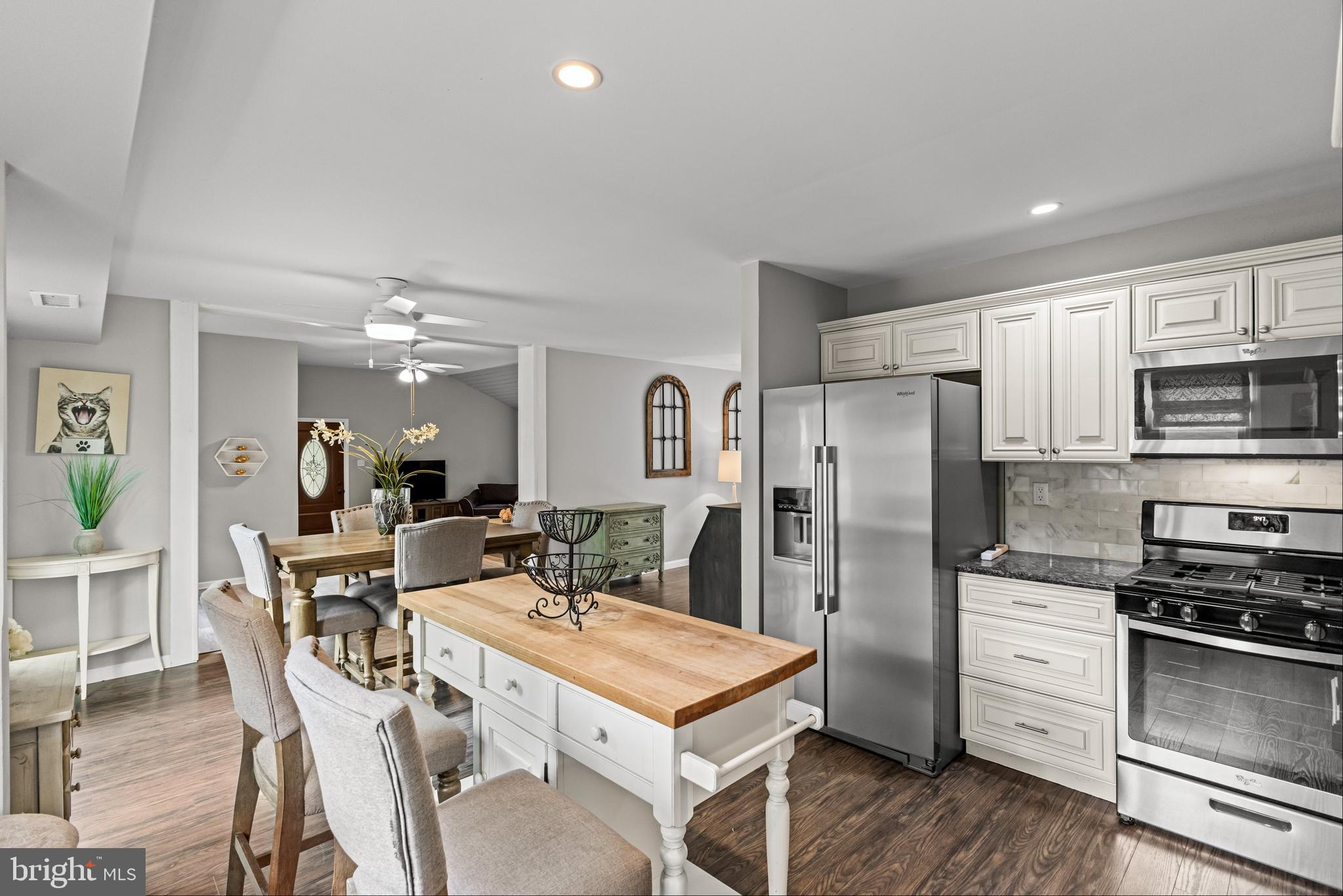 28 Windmill Clementon, NJ 08021 - Photo 12 of 28 a kitchen with stainless steel appliances a refrigerator stove microwave and cabinets