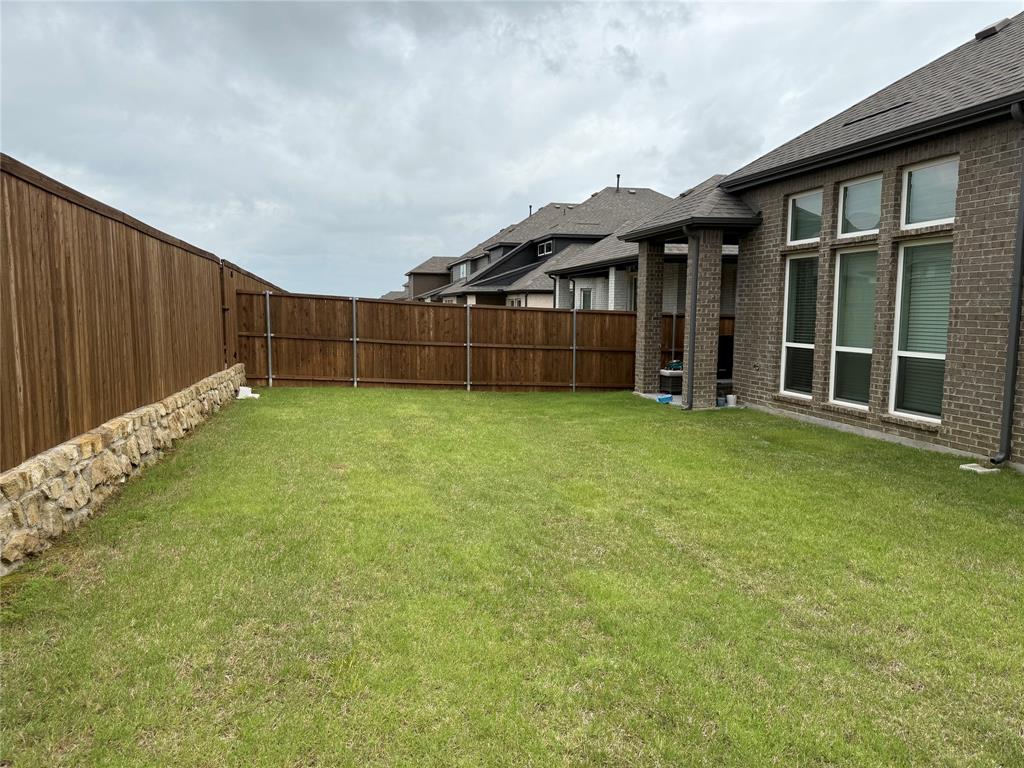 6246 Shasta Creek Road Celina, TX 75009 - Photo 5 of 24 a view of a house with backyard and porch