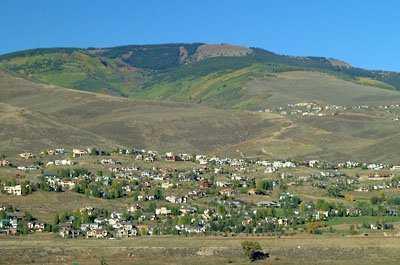 a view of a road with an ocean
