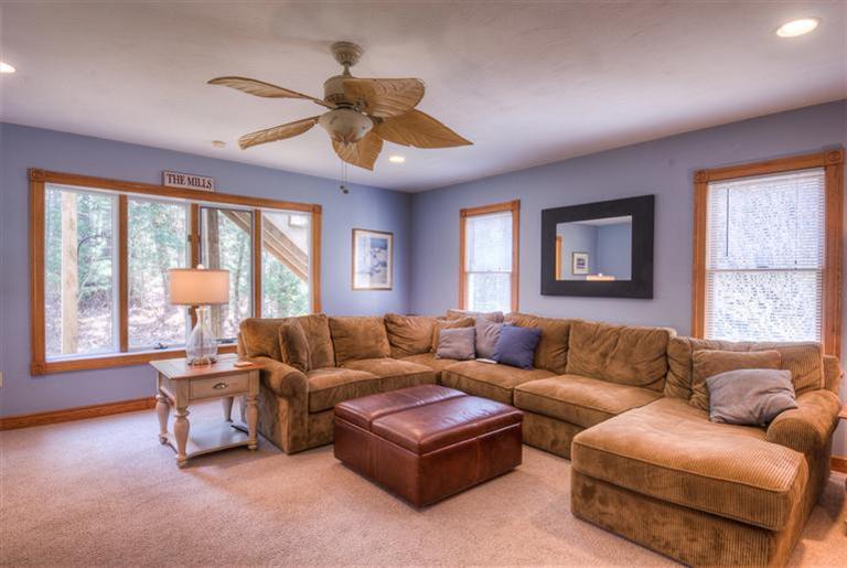 200 Evergreen Drive Marstons Mills, MA 02648 - Photo 12 of 25 a living room with furniture and a large window