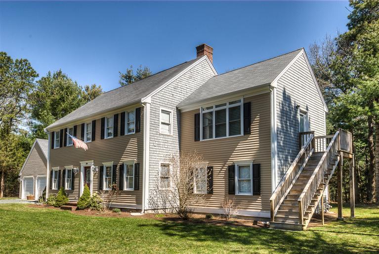 200 Evergreen Drive Marstons Mills, MA 02648 - Photo 2 of 25 a front view of a house with a yard