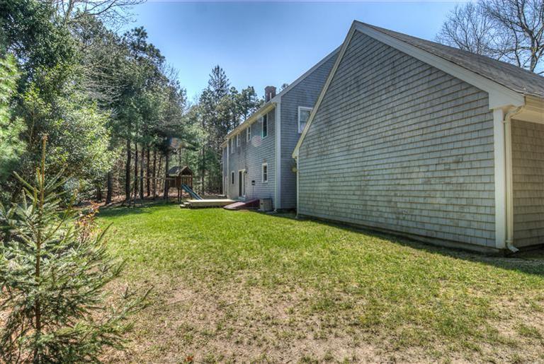 200 Evergreen Drive Marstons Mills, MA 02648 - Photo 22 of 25 a view of a backyard with pathway
