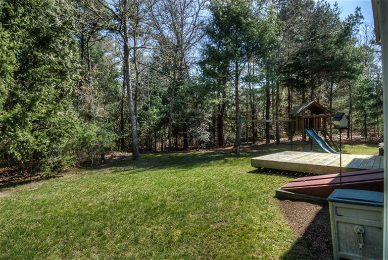 200 Evergreen Drive Marstons Mills, MA 02648 - Photo 25 of 25 a view of a bench in a garden