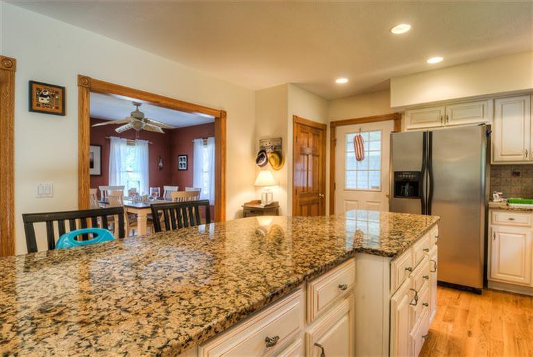200 Evergreen Drive Marstons Mills, MA 02648 - Photo 8 of 25 a kitchen with stainless steel appliances granite countertop a refrigerator and a sink