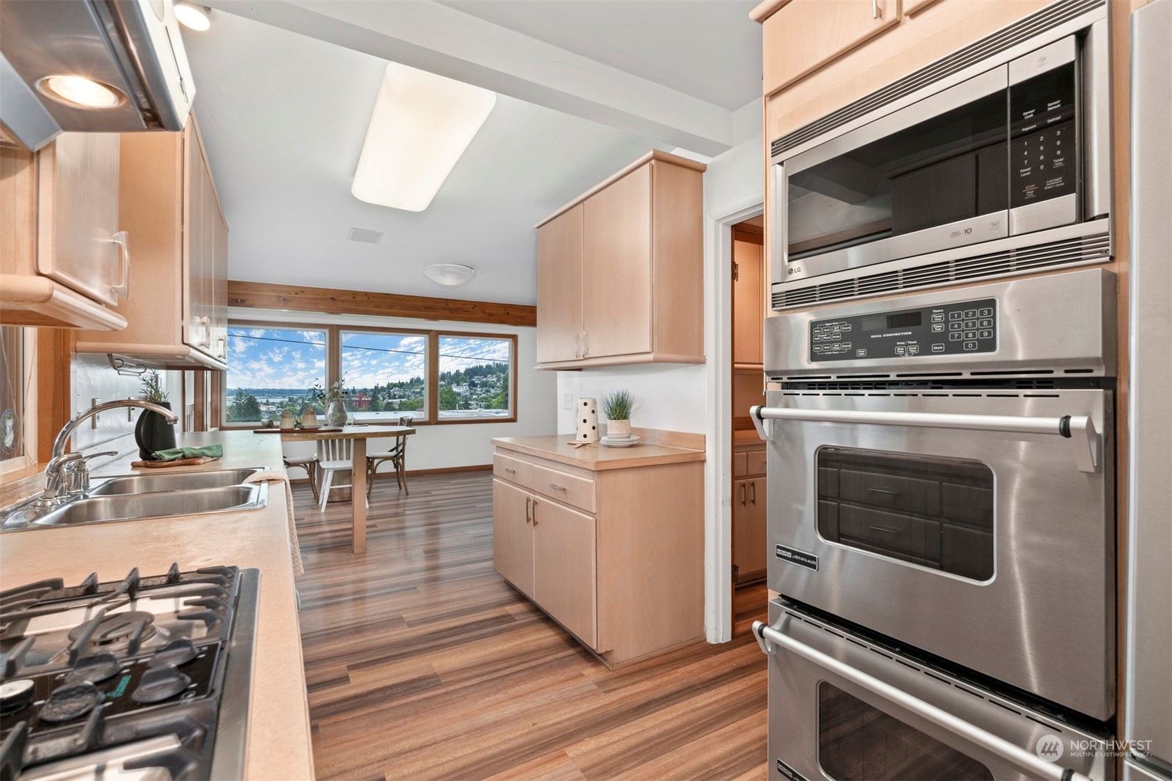 117 Underhill Road Bellingham, WA 98225 - Photo 13 of 40 a kitchen with a stove and a microwave
