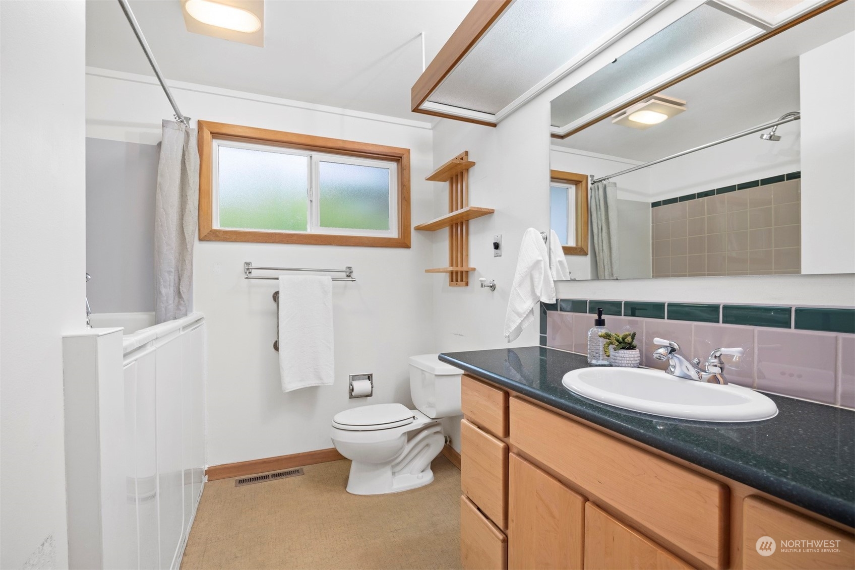 117 Underhill Road Bellingham, WA 98225 - Photo 24 of 40 a bathroom with a sink toilet and mirror