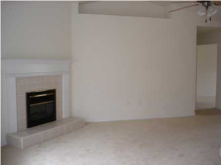112 Shipwreck Road Santa Rosa Beach, FL 32459 - Photo 8 of 23 a view of an empty room with a fireplace