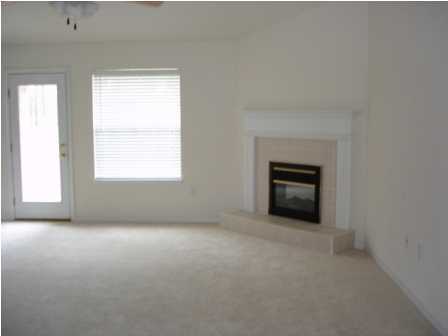 112 Shipwreck Road Santa Rosa Beach, FL 32459 - Photo 9 of 23 a view of empty room with a fireplace