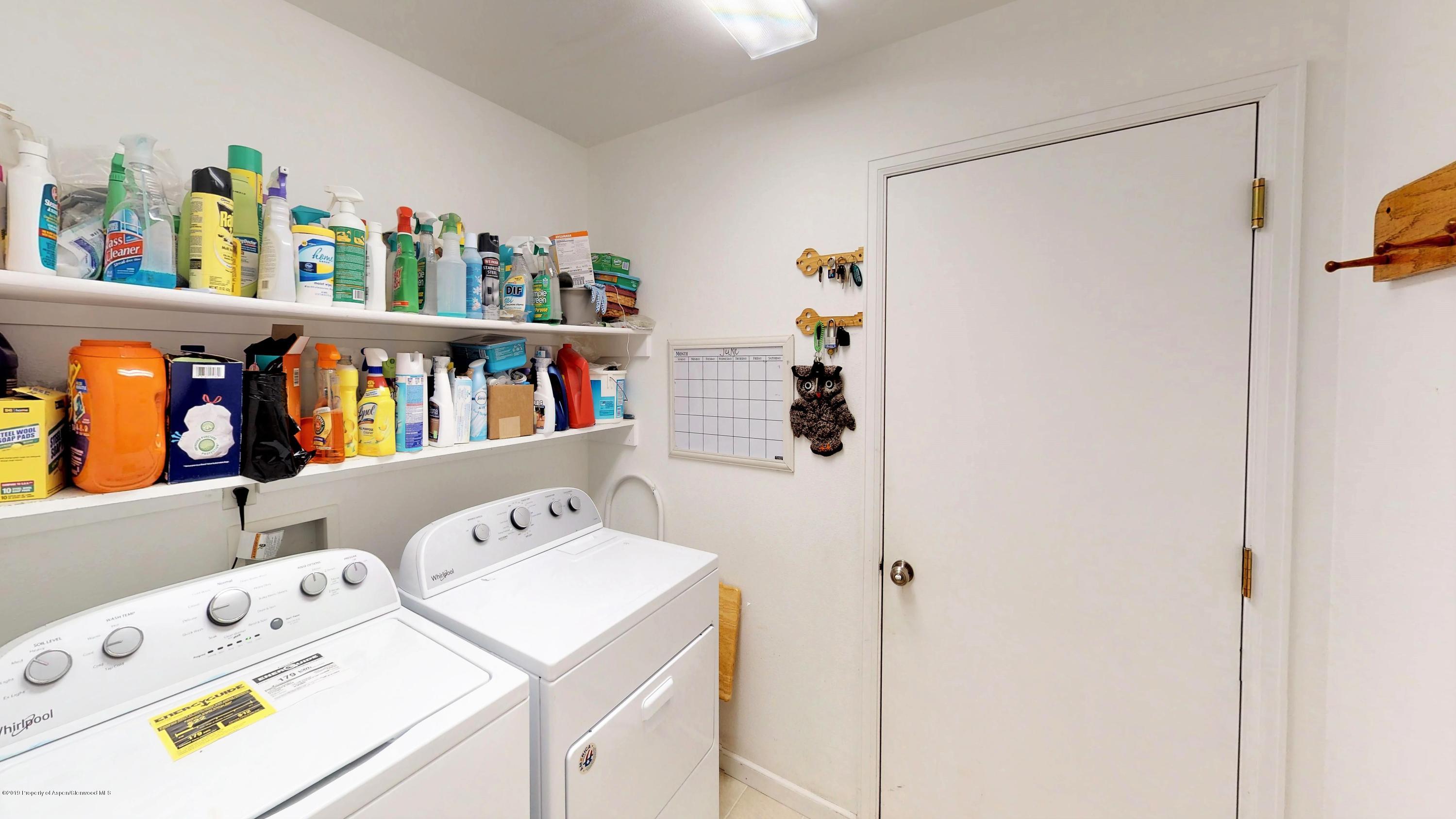 1293 Fir Avenue Rifle, CO 81650 - Photo 8 of 49 a utility room with dryer and washer