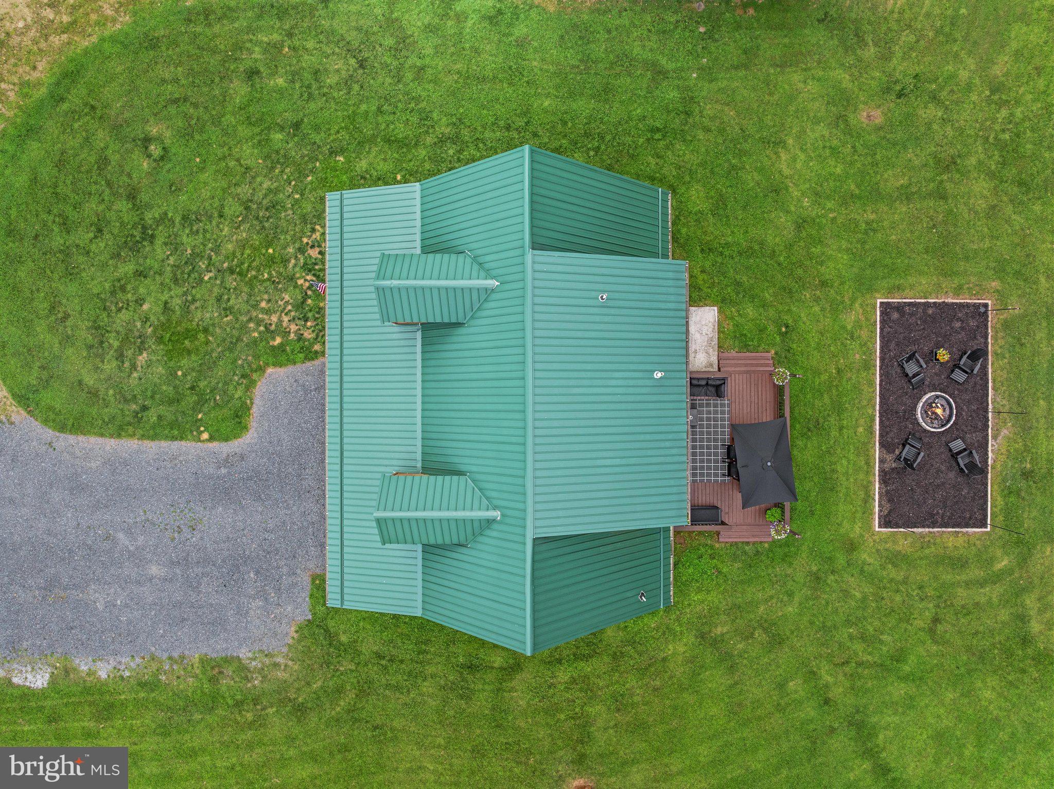 1396 Cullers Run Road Mathias, WV 26812 - Photo 58 of 79 Charming green-roofed home on lush grounds.