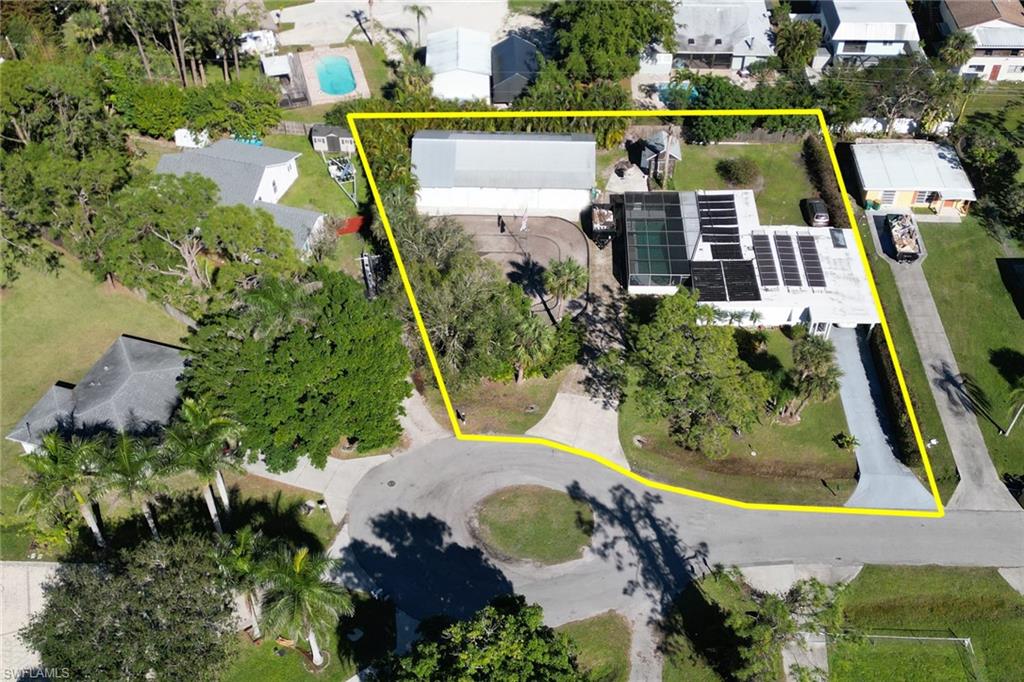 160 4th Street Naples, FL 34113 - Photo 29 of 34 an aerial view of swimming pool