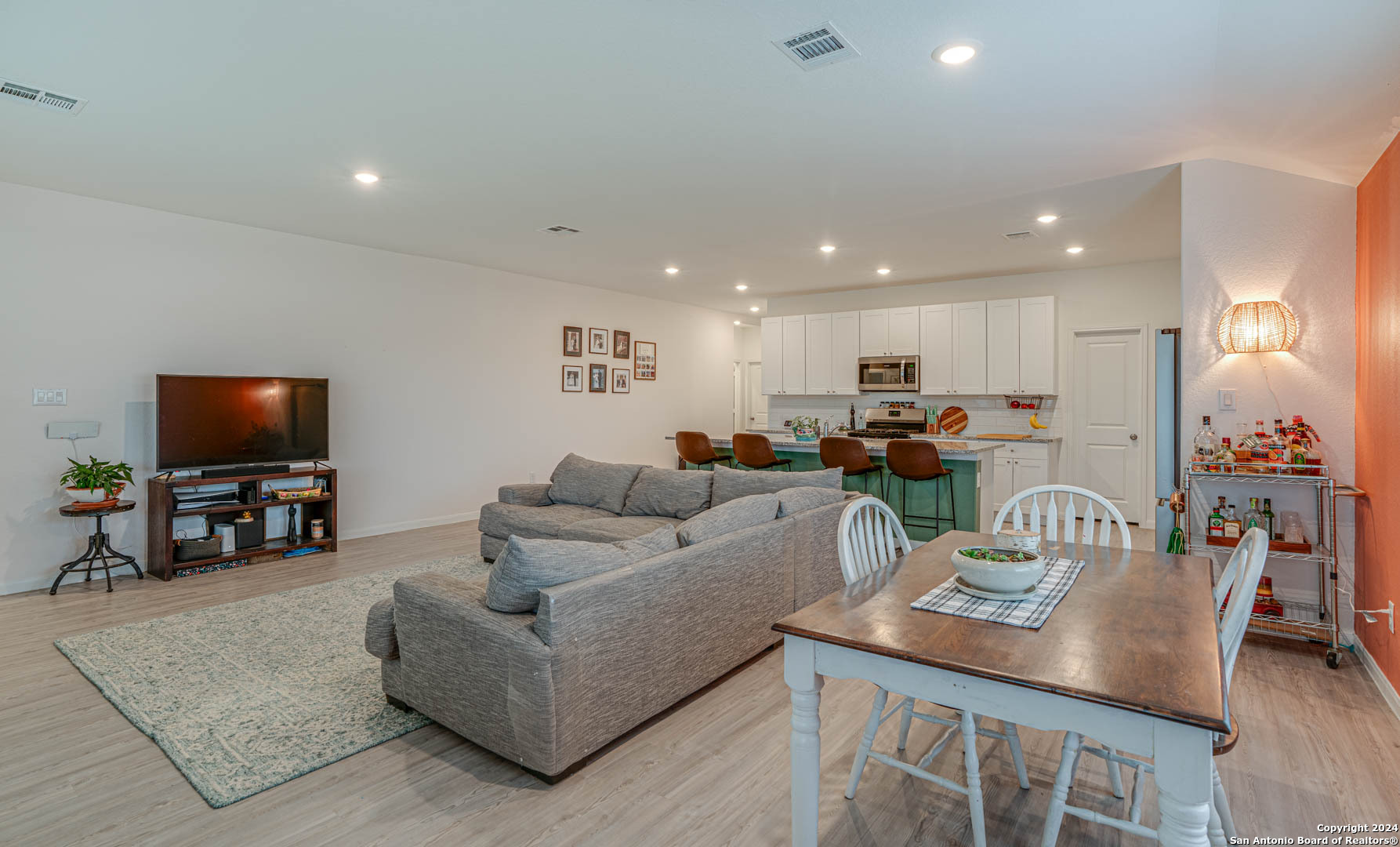 14606 Somerset Mill San Antonio, TX 78254 - Photo 14 of 19 a living room with furniture and a flat screen tv