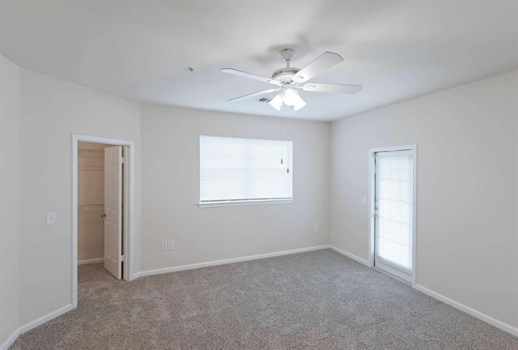 10505 I-35 Frontage Road South, Unit 632 Austin, TX 78747 - Photo 14 of 22 a view of an empty room with a window