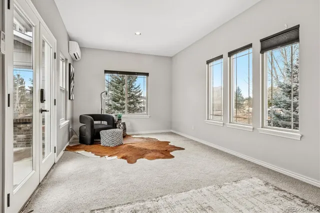 a bed room with a bed and a window