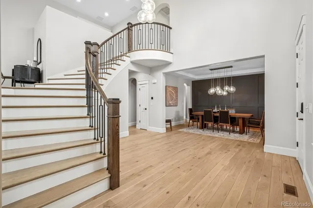 a view of a livingroom with furniture and a flat screen tv