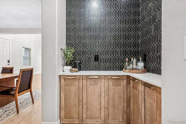 a view of a kitchen with chair and table