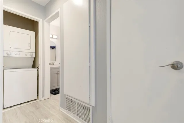 a view of a bathroom from a hallway