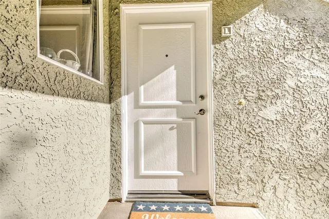 a view of a bathroom with mirror