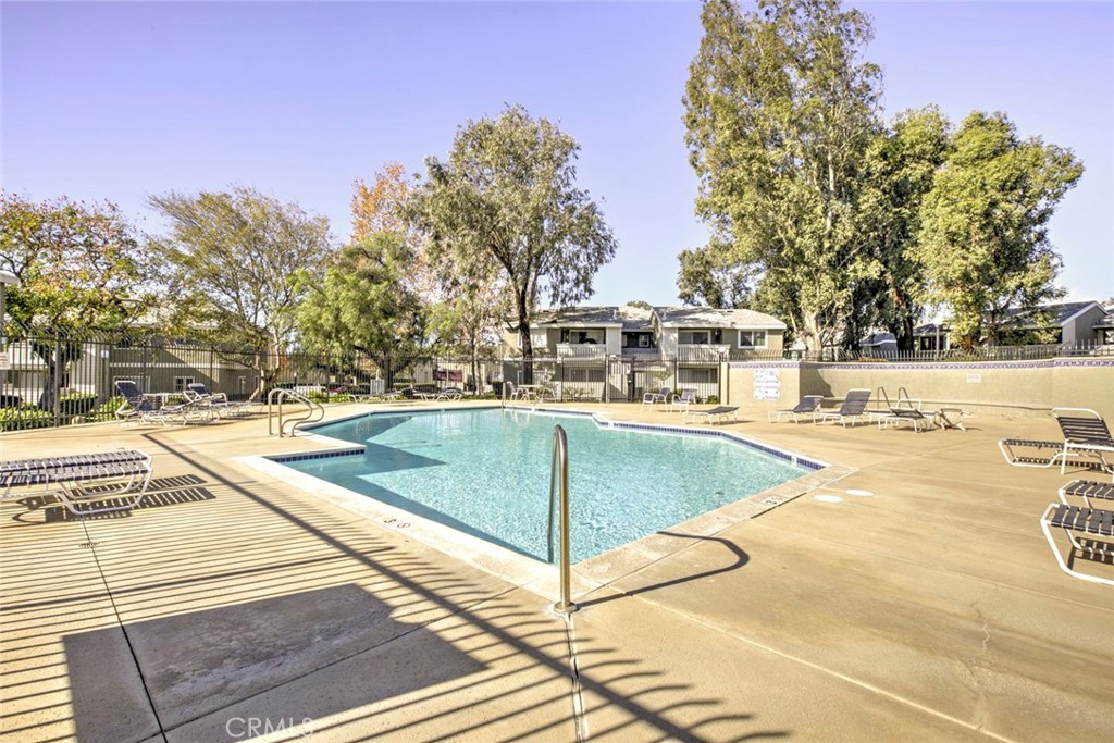 27620 Susan Beth Way, Unit L Saugus, CA 91350 - Photo 22 of 26 a view of a swimming pool with a patio