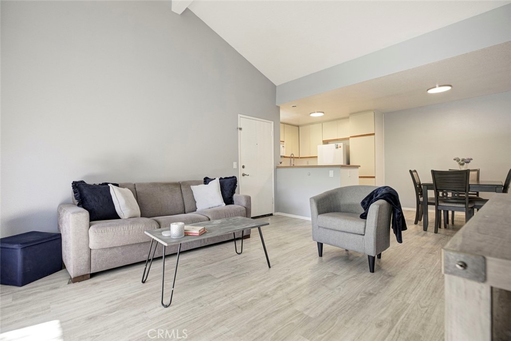 27620 Susan Beth Way, Unit L Saugus, CA 91350 - Photo 4 of 26 a living room with furniture and a couch