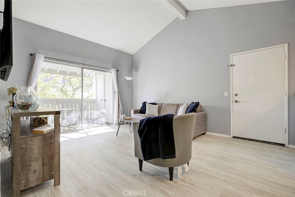 27620 Susan Beth Way, Unit L Saugus, CA 91350 - Photo 6 of 26 a living room with furniture and a window