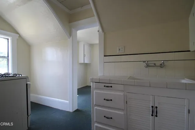 a view of a closet with cabinet
