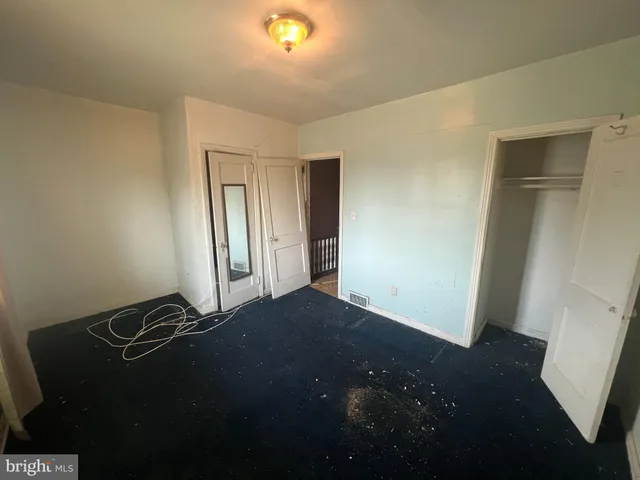 a view of a livingroom with a closet