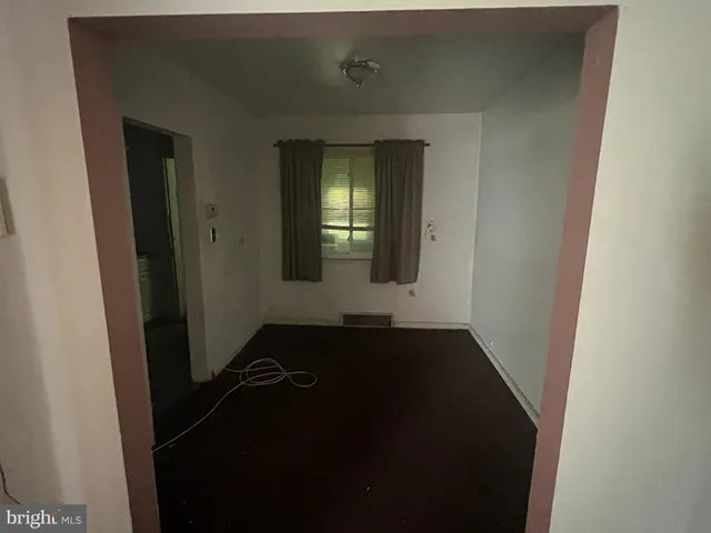 a view of hallway with windows