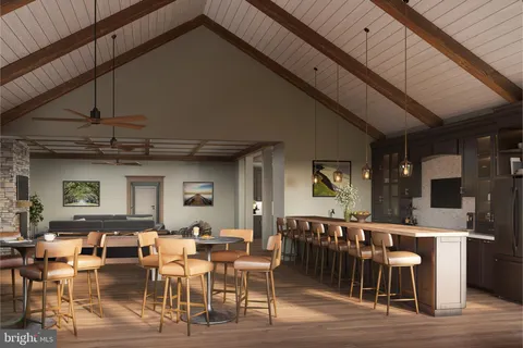 a view of a dining area with furniture and chandelier