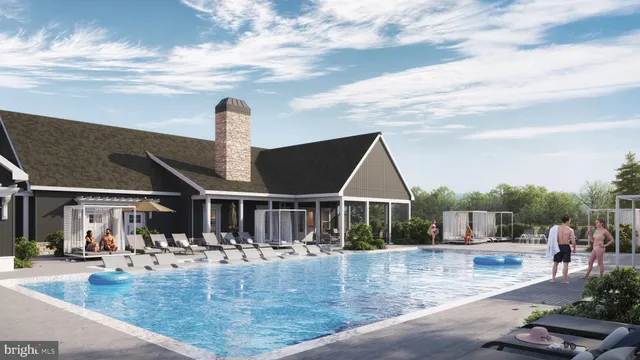 a view of a house with swimming pool and sitting area