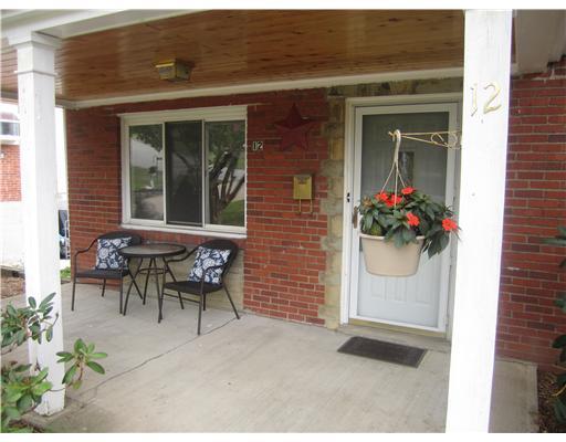12 Robinhood Road Green Tree, PA 15220 - Photo 2 of 9 Exterior Front. Quant and cozy front porch! Sit and unwind at the end of a long day and enjoy the peacefulness of this quiet neighborhood.
