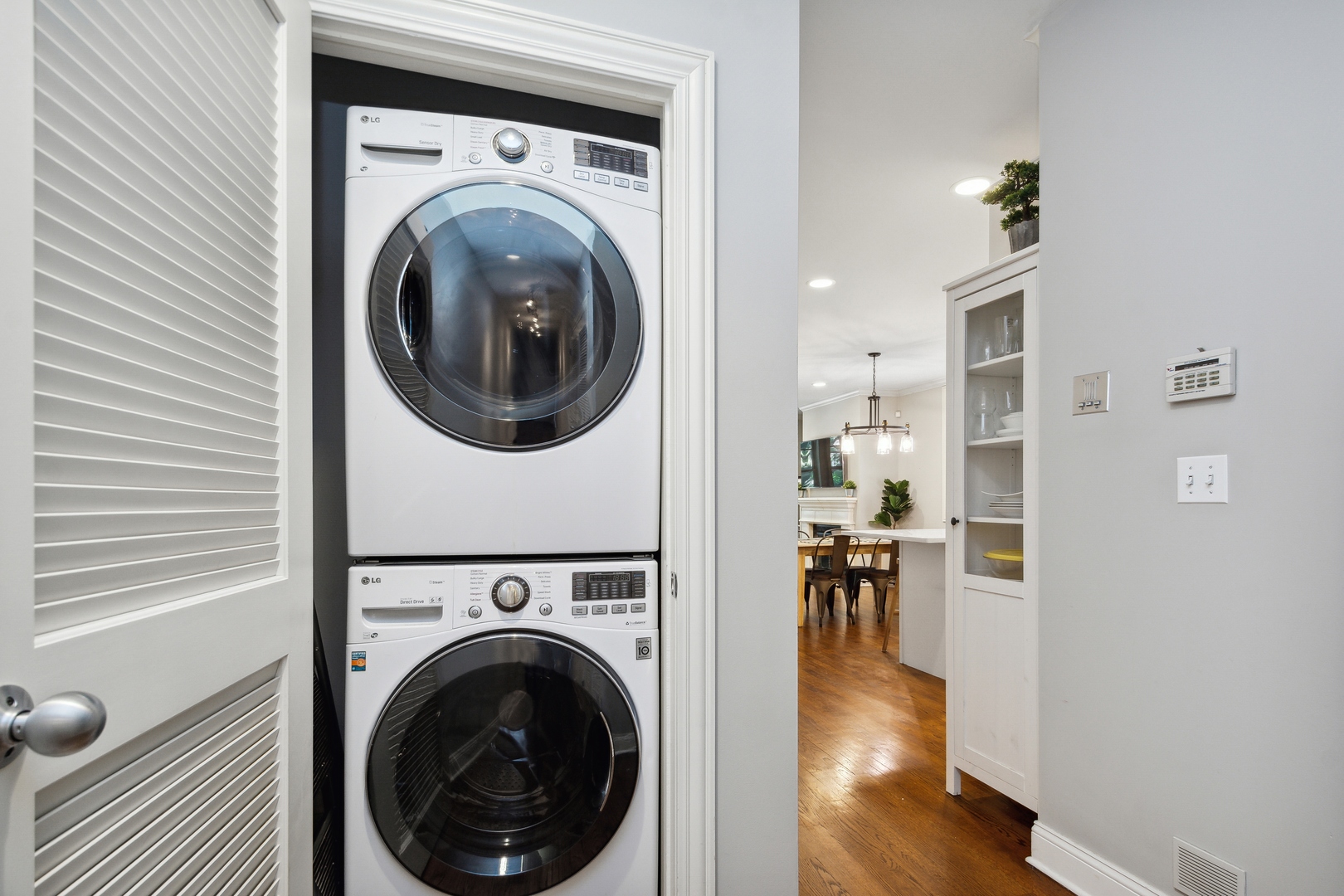 2147 West Rice Street, Unit 2E Chicago, IL 60622 - Photo 14 of 16 a view of a hallway with washer and dryer