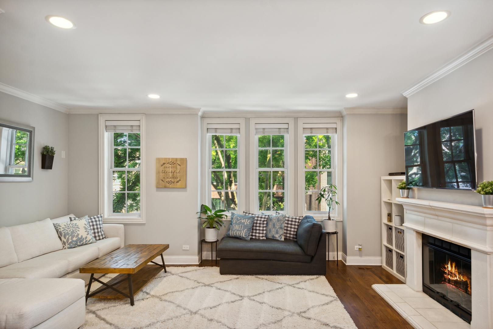 2147 West Rice Street, Unit 2E Chicago, IL 60622 - Photo 2 of 16 a living room with furniture and a fireplace