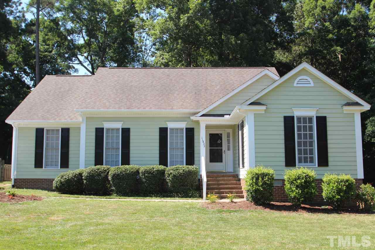 11833 North Exeter Way Raleigh, NC 27613 - Photo 1 of 16 a view of a house with a yard