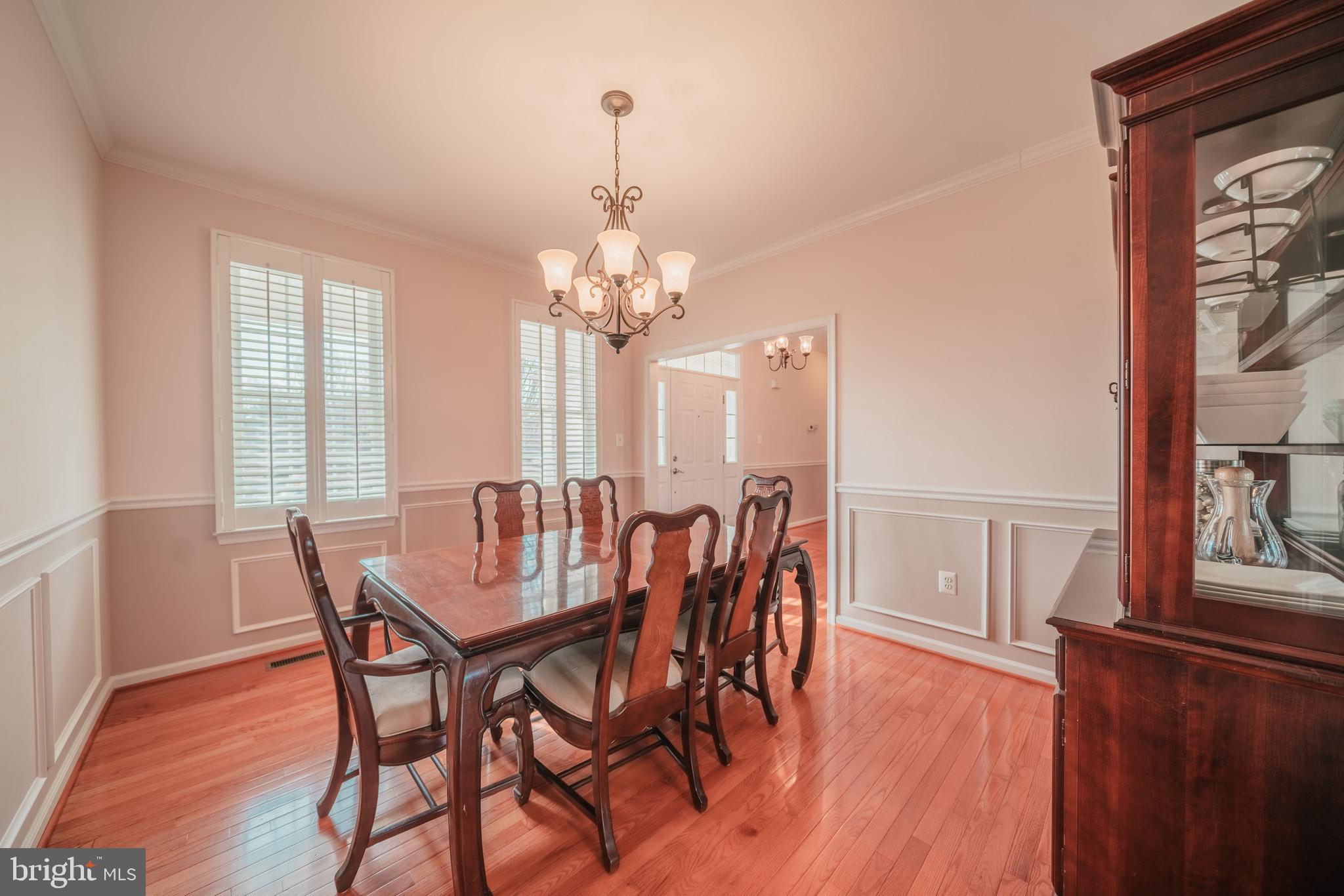 15186 Spring Ridge Road Culpeper, VA 22701 - Photo 10 of 36 Formal dining room with lots of moldings & windows