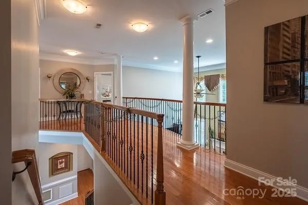a view of entryway with wooden floor