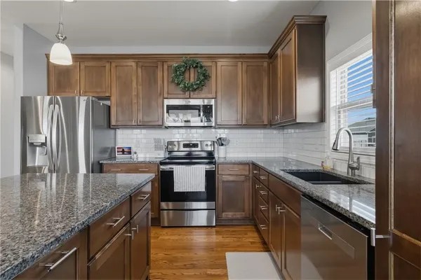 $490,000 | 647 Southwest Crestview Drive, Grain Valley, MO 64029