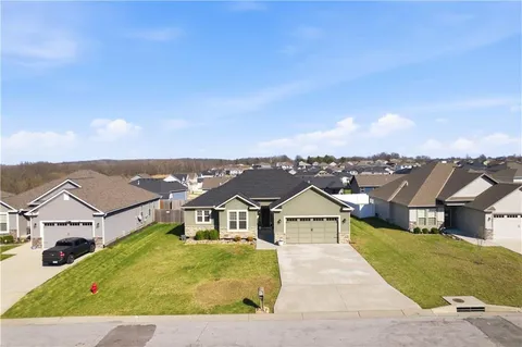 $490,000 | 647 Southwest Crestview Drive, Grain Valley, MO 64029